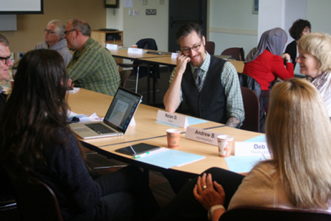 WWU faculty in small groups participating in workshop